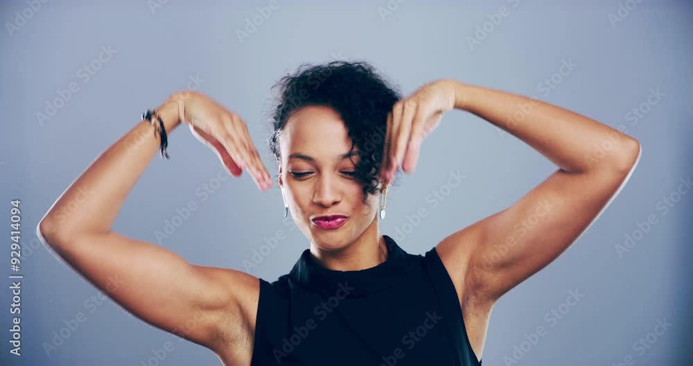 Happy, dance and face of woman in studio for celebration, victory and excited on gray background. Dancer, energy and portrait of isolated person moving to audio, music and song playlist for freedom Happy, dance and face of woman in studio for celebration, victory and excited on gray background. Dancer, energy and portrait of isolated person moving to audio, music and song playlist for freedom