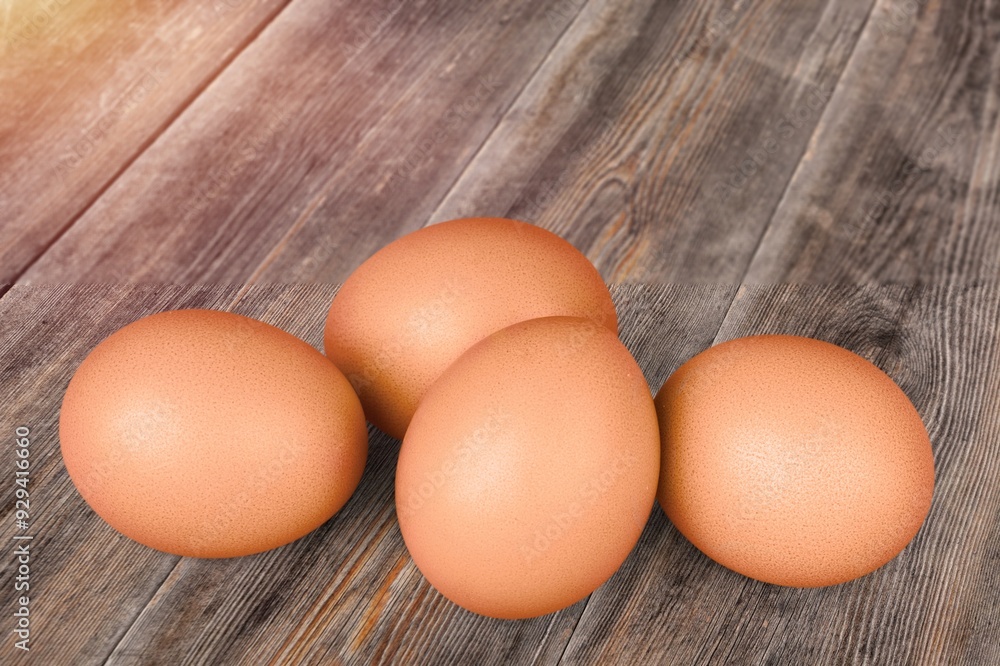 Stack of fresh tasty chicken egg on desk Stack of fresh tasty chicken egg on desk