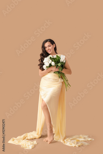 Pretty young woman with bou...
