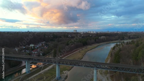 Grosshesseloher Brucke on Isar River in Munich, Germany aerial view. Two-story railroad and pedestrian bridge in Munchen over Isar River. Eisenbahnbrucke. Bike path runs under Railroad tracks.  photo