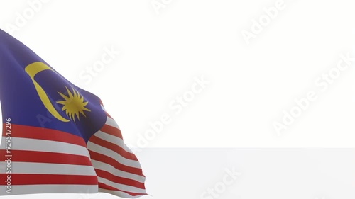 3D rendering of the Malaysian flag flying on a white isolated background. Suitable to place on content with that theme. photo