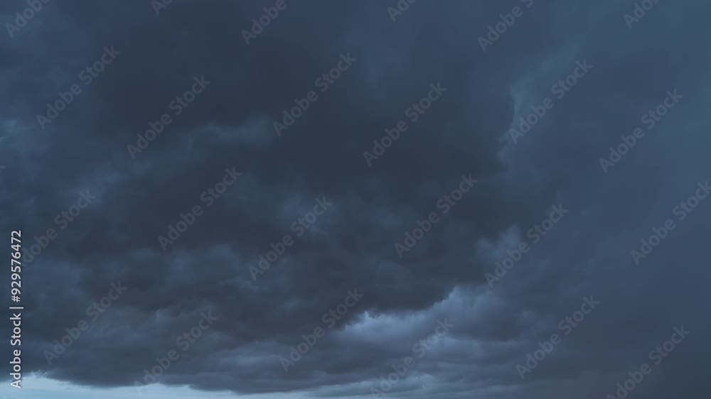 Time lapse of dramatic dark grey clouds sky with thunder storm and rain. Abstract nature landscape background. Time lapse of dramatic dark grey clouds sky with thunder storm and rain. Abstract nature landscape background.