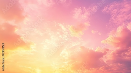 A beautiful sunset sky with pastel colors and fluffy clouds.