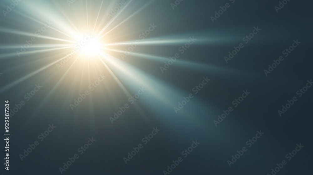 A bright light shining through a dark sky A bright light shining through a dark sky