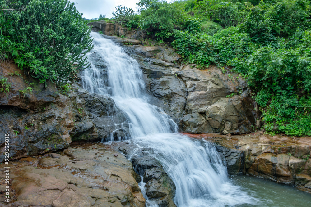 Fototapeta premium A waterfall during the monsoons near Pune India. Monsoon is the annual rainy season in India from June to September.
