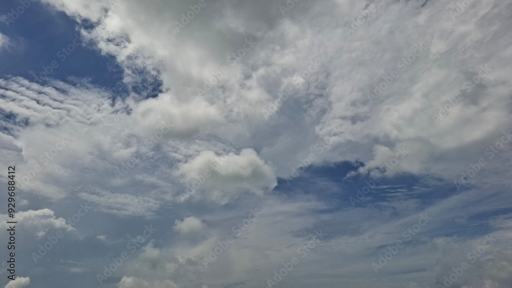 White Fluffy Clouds Against Blue Sky White Fluffy Clouds Against Blue Sky