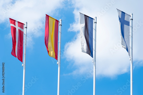 EU national flags flutter in wind, government Buildings, Space Agency, Parliament, Council Europe, Court of Justice, European Commission photo