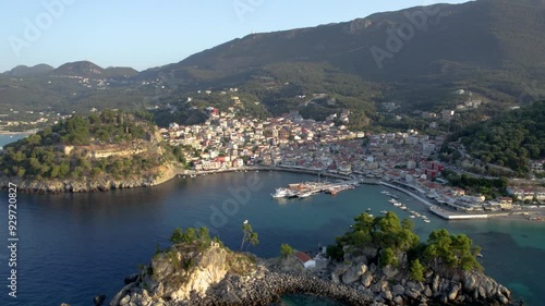 Aerial Dolly shot of Parga and Panagia Islet, Greek Riviera Ionian Sea, City Center and Venetian Castle Panorama, Preveza Greece photo