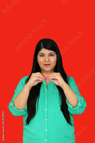 30-year-old Latina woman speaks Mexican Sign Language used by deaf people in Mexico