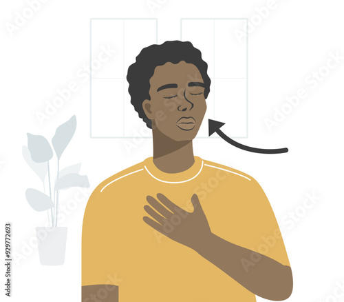 Young male standing and breathing exercise in the home.