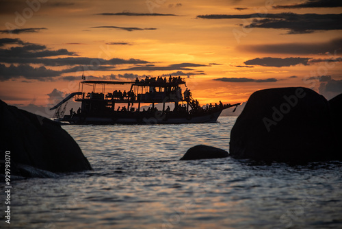 Ship on the ocean with sunset