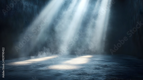 A dimly lit space with beams of light and misty atmosphere.