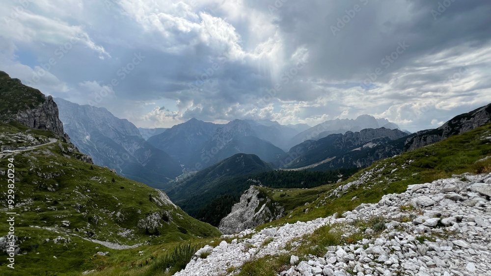 Obraz premium mountains and clouds Mangart Julian Alps 2,679 meters peak hiking nature Slovenia 