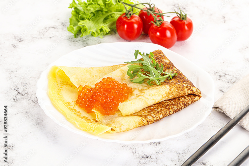Russian pancake with red caviar Russian pancake with red caviar