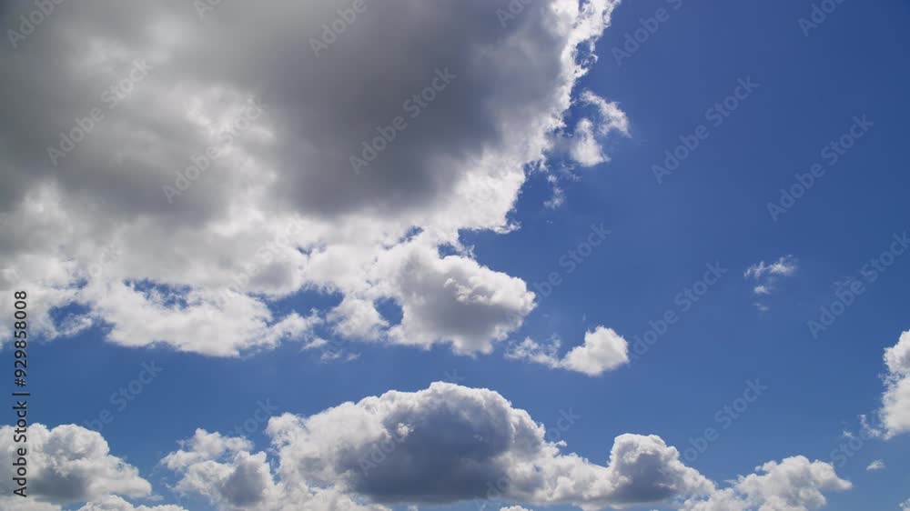 Blue Sky with Fluffy White Clouds on a Sunny Day Cloudscape Blue Sky with Fluffy White Clouds on a Sunny Day Cloudscape