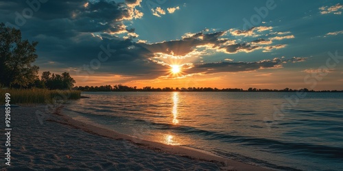 Fototapeta Naklejka Na Ścianę i Meble -  Sunset over lake or ocean