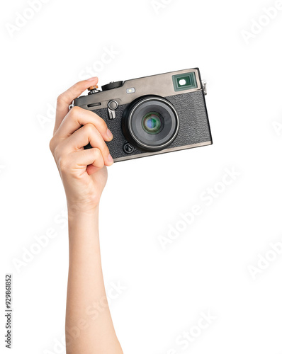 hand holding vintage camera on isolated white background.