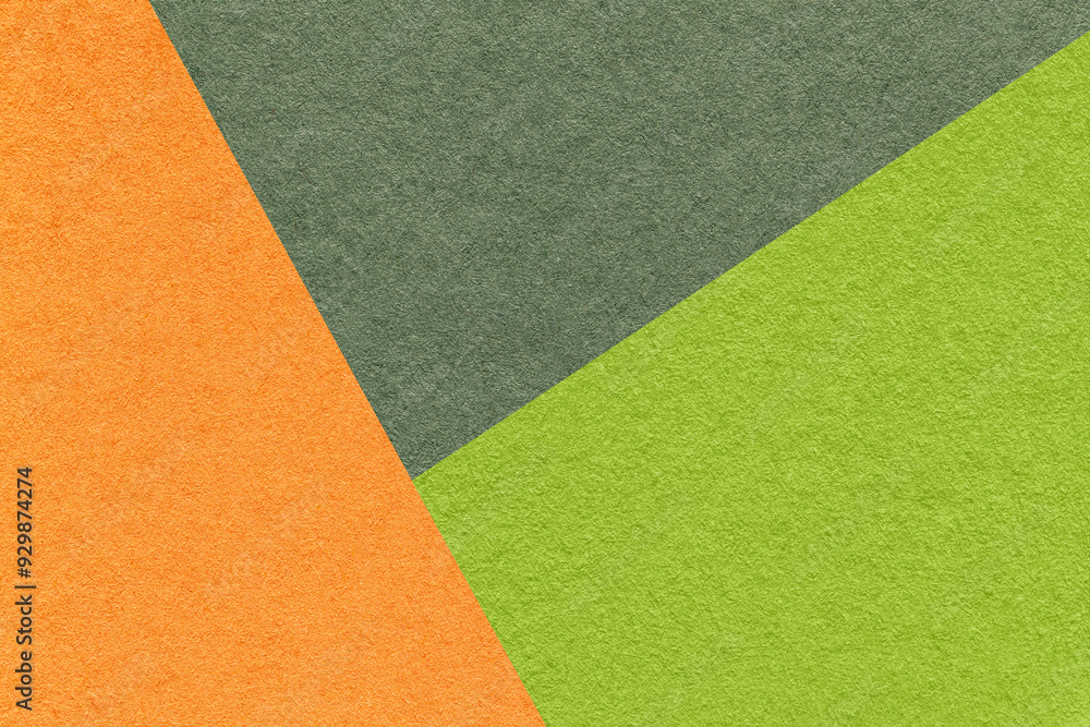 Texture craft orange, green and olive paper background, macro. Vintage abstract khaki cardboard Texture craft orange, green and olive paper background, macro. Vintage abstract khaki cardboard