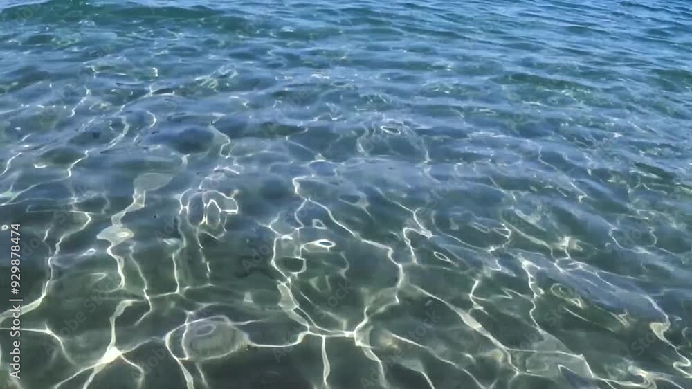 Reflection of the light on the water’s waves along the shore. Reflection of the light on the water’s waves along the shore.