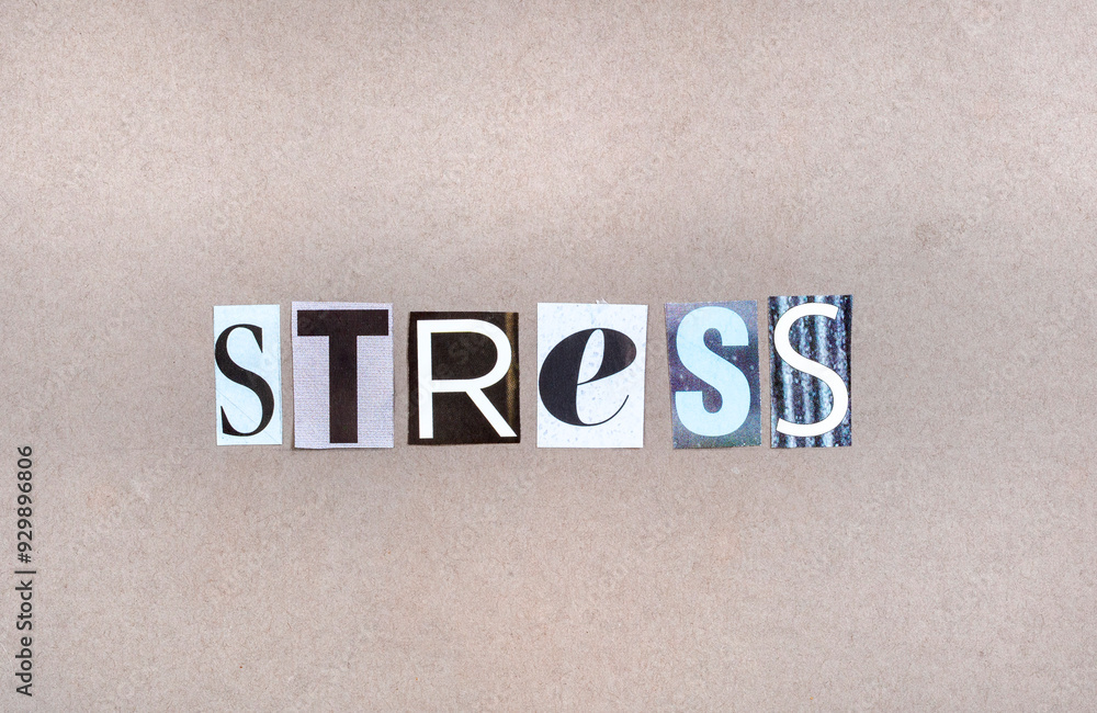 The word stress in magazine snippets on grey background The word stress in magazine snippets on grey background