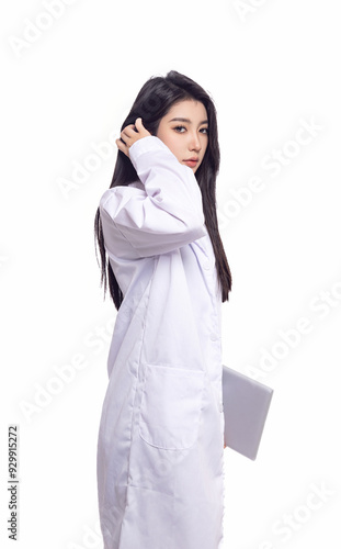 Image of a young female doctor in a white lab coat in front of a white background