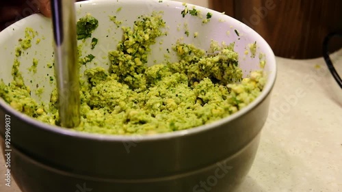 Falafel mass, chickpea mass with herbs and spices 4k video, close-up