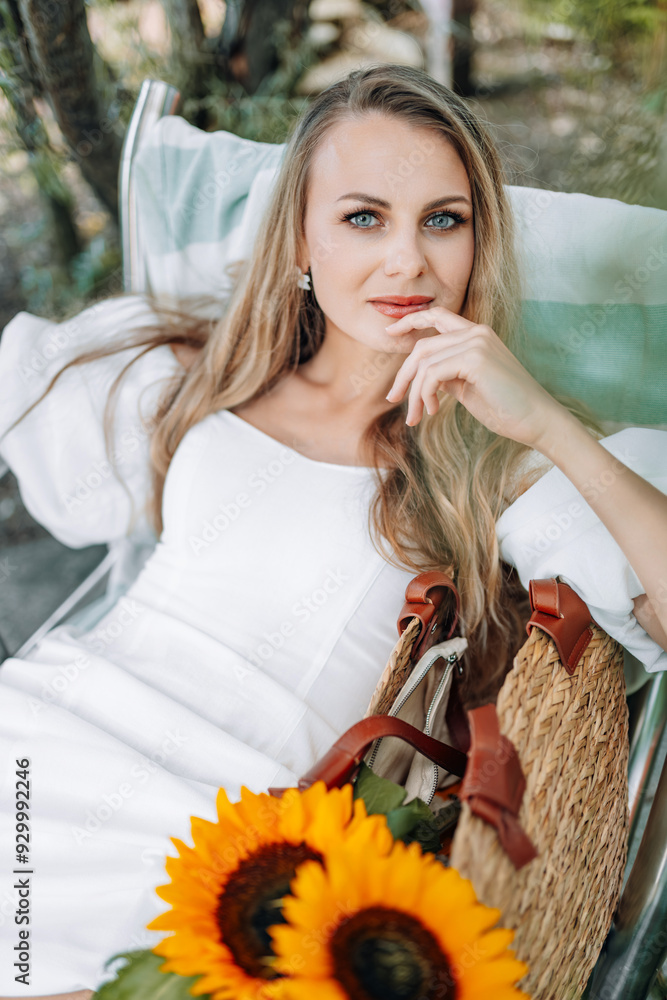 photo in Italian style with a sexy young woman in a light summer dress a peasant woman picking fruits
