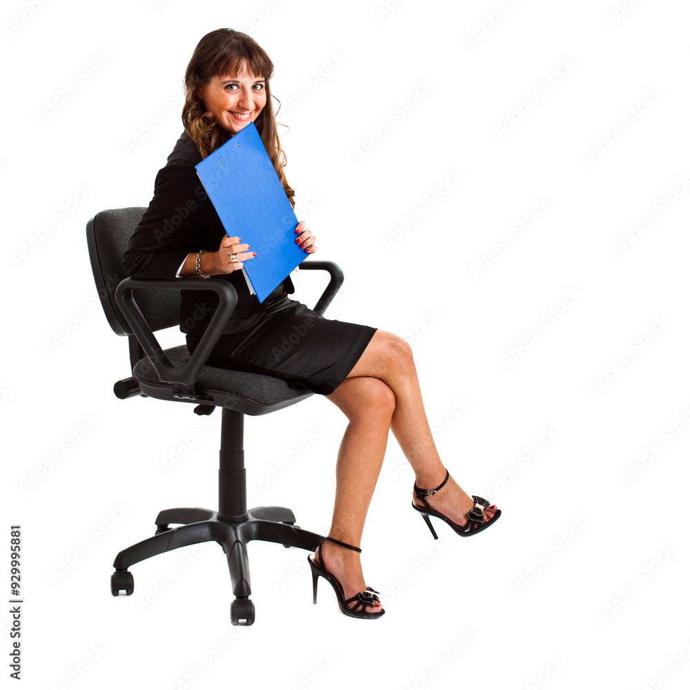 Professional woman holding clipboard sitting in office chair Professional woman holding clipboard sitting in office chair