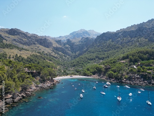 Cala Tuent Bay with Yachts Anchored in Mallorca's Serene Mountainous Coastline