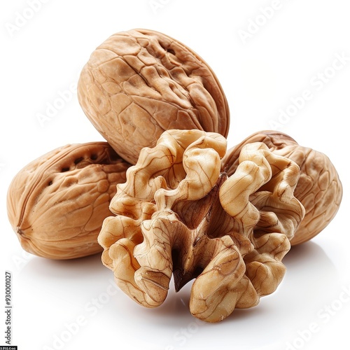 Close-up of whole and shelled walnuts on a white background. Perfect for culinary, organic, and healthy eating concepts. photo