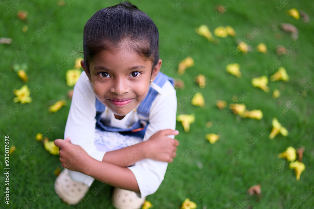 Smiling Girl in Spring Grass