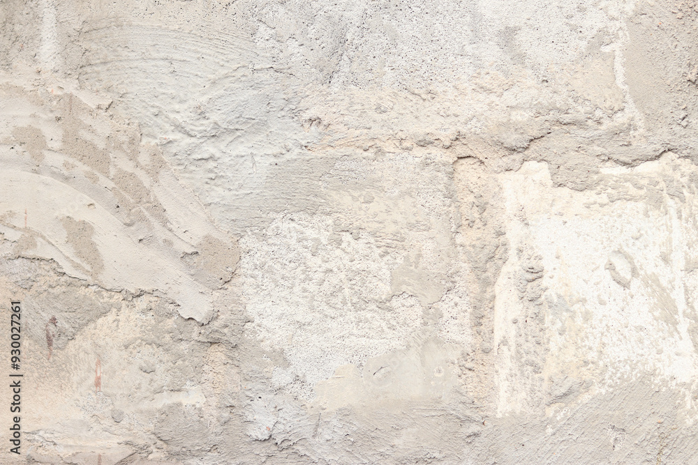 Texture of a wall with putty, concrete. Background of the exterior wall of a house during construction. Background of unfinished exterior gray wall Texture of a wall with putty, concrete. Background of the exterior wall of a house during construction. Background of unfinished exterior gray wall