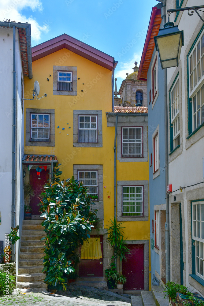 Obraz premium Facade of colorful buildings among the streets of the old city in Porto, Portugal.