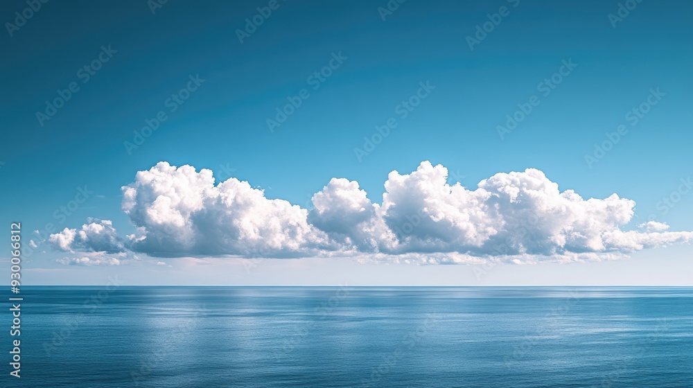 A serene view of clouds drifting over a calm ocean, with the horizon in sight. A serene view of clouds drifting over a calm ocean, with the horizon in sight.