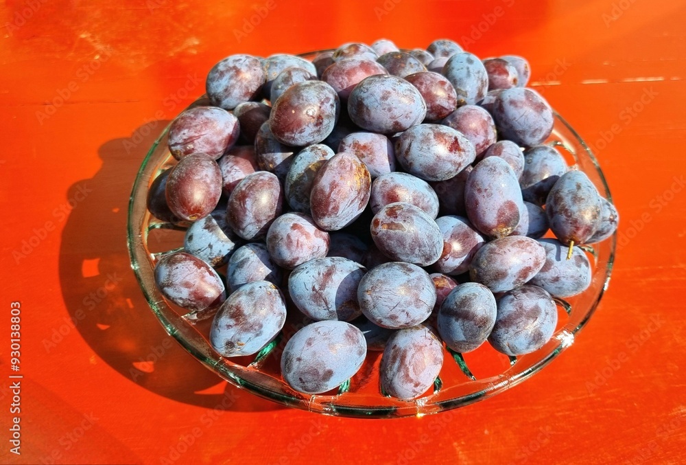 A bowl with cultivated plums A bowl with cultivated plums