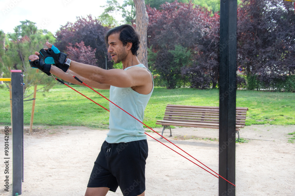 A man is exercising with a resistance band A man is exercising with a resistance band
