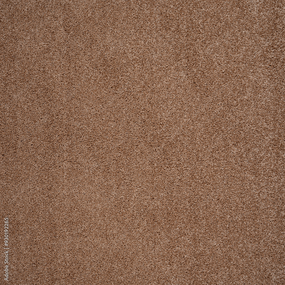 Fototapeta premium Close-up of Brown Textured Surface with Soft, Speckled Pattern