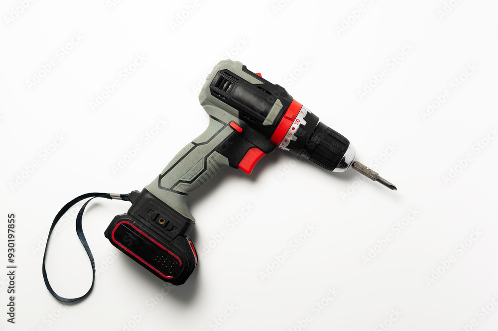 Drilling equipment, electric tool drill, cordless screwdriver. Working industrial power tool, screwdriver on white background Drilling equipment, electric tool drill, cordless screwdriver. Working industrial power tool, screwdriver on white background
