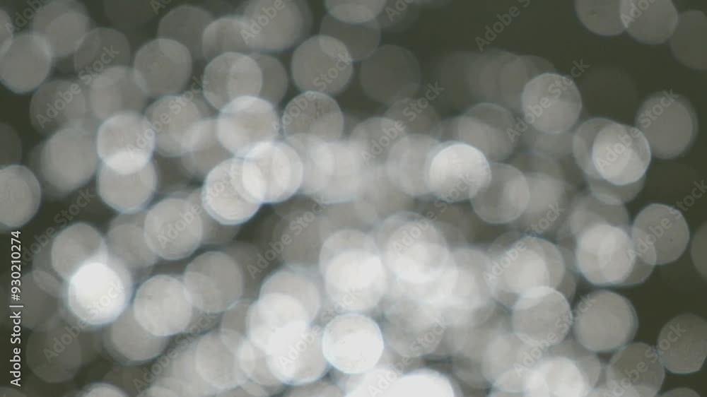 Water bokeh dots reflected by sunlight. Water bokeh with abstract shapes, patterns and textures. 4K,60Fps Water bokeh dots reflected by sunlight. Water bokeh with abstract shapes, patterns and textures. 4K,60Fps