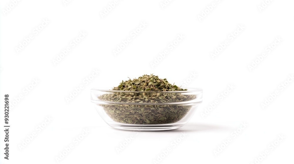 A front-facing shot of dried oregano in a transparent bowl, isolated on white, with a minimalistic composition that highlights the herb's texture. A front-facing shot of dried oregano in a transparent bowl, isolated on white, with a minimalistic composition that highlights the herb's texture.