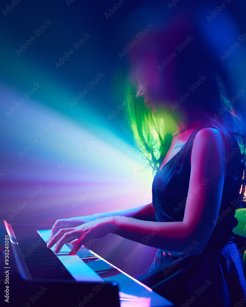 Side view photo of young woman, musician playing piano and singing. Stage performance. Festival of instrumental music. Concept of classical and modern music, entertainment, jazz. Ad Side view photo of young woman, musician playing piano and singing. Stage performance. Festival of instrumental music. Concept of classical and modern music, entertainment, jazz. Ad