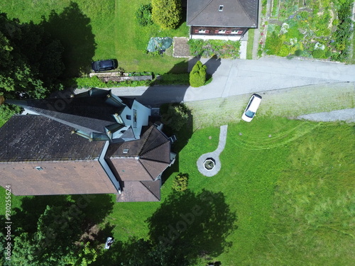 Aerial view of Kuratienkirche Meschach surrounded by lush greenery. Gotzis, Austria photo