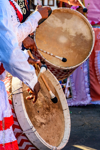 Colorful drummers during a religious manifestation of Afro-Brazilian culture on the streets of Brazil