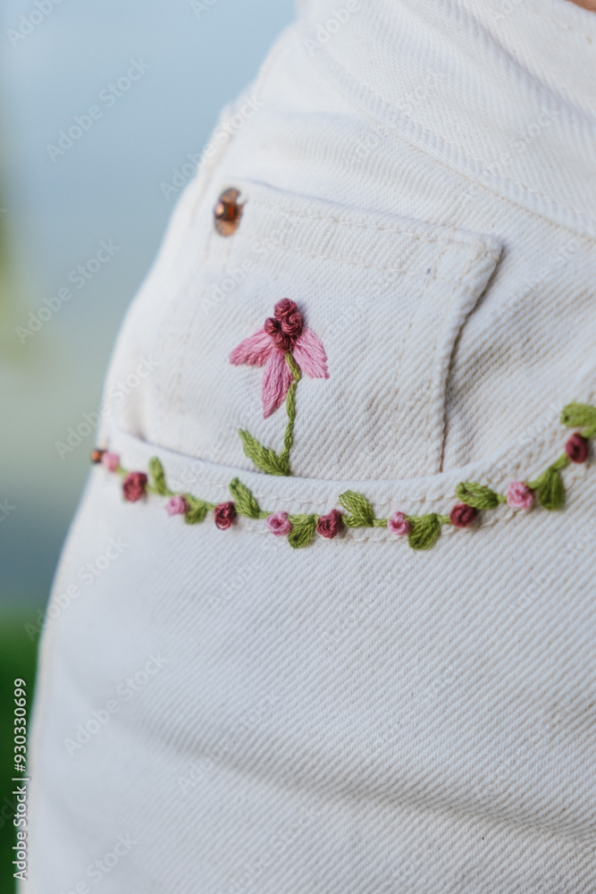 flowers hand embroidery on shorts, close up flowers hand embroidery on shorts, close up