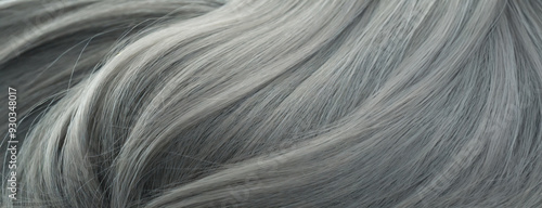 Obraz na płótnie Close-up of gray hair strands, highlighting the texture and color variations of aging hair in a detailed and intimate shot. w salonie