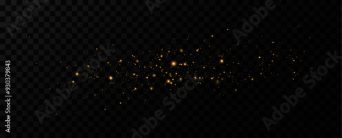 Golden sequins glow with many lights. Glittering dust. Luxurious background of golden particles.