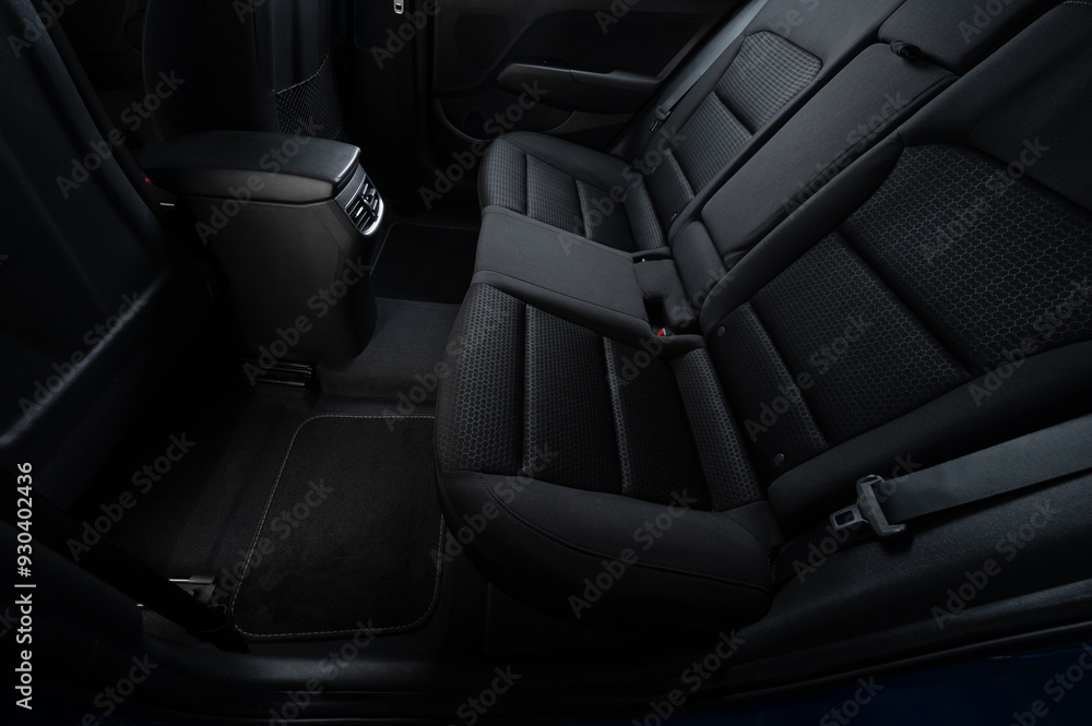 Clean car interior with soft dark mats Clean car interior with soft dark mats
