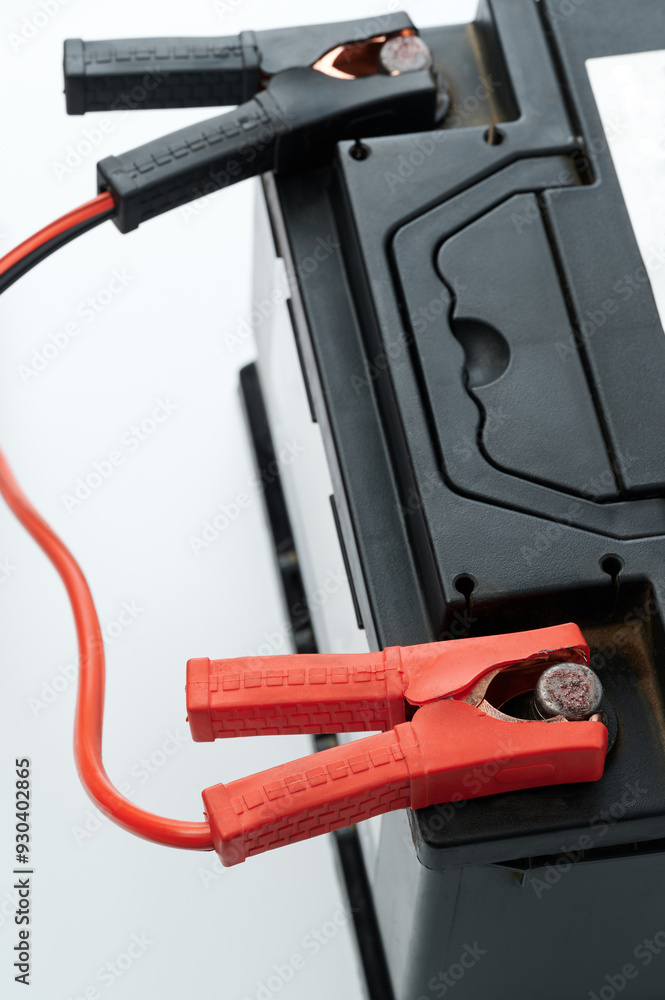 Car battery connected with jump cable Car battery connected with jump cable