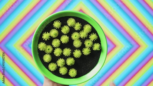 Crunchy Small Velcro Hook Balls disattachend from Loop Velcro with abstract background