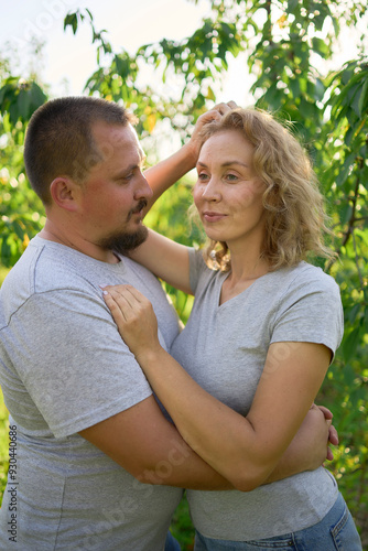 a middle-aged couple in love in the garden